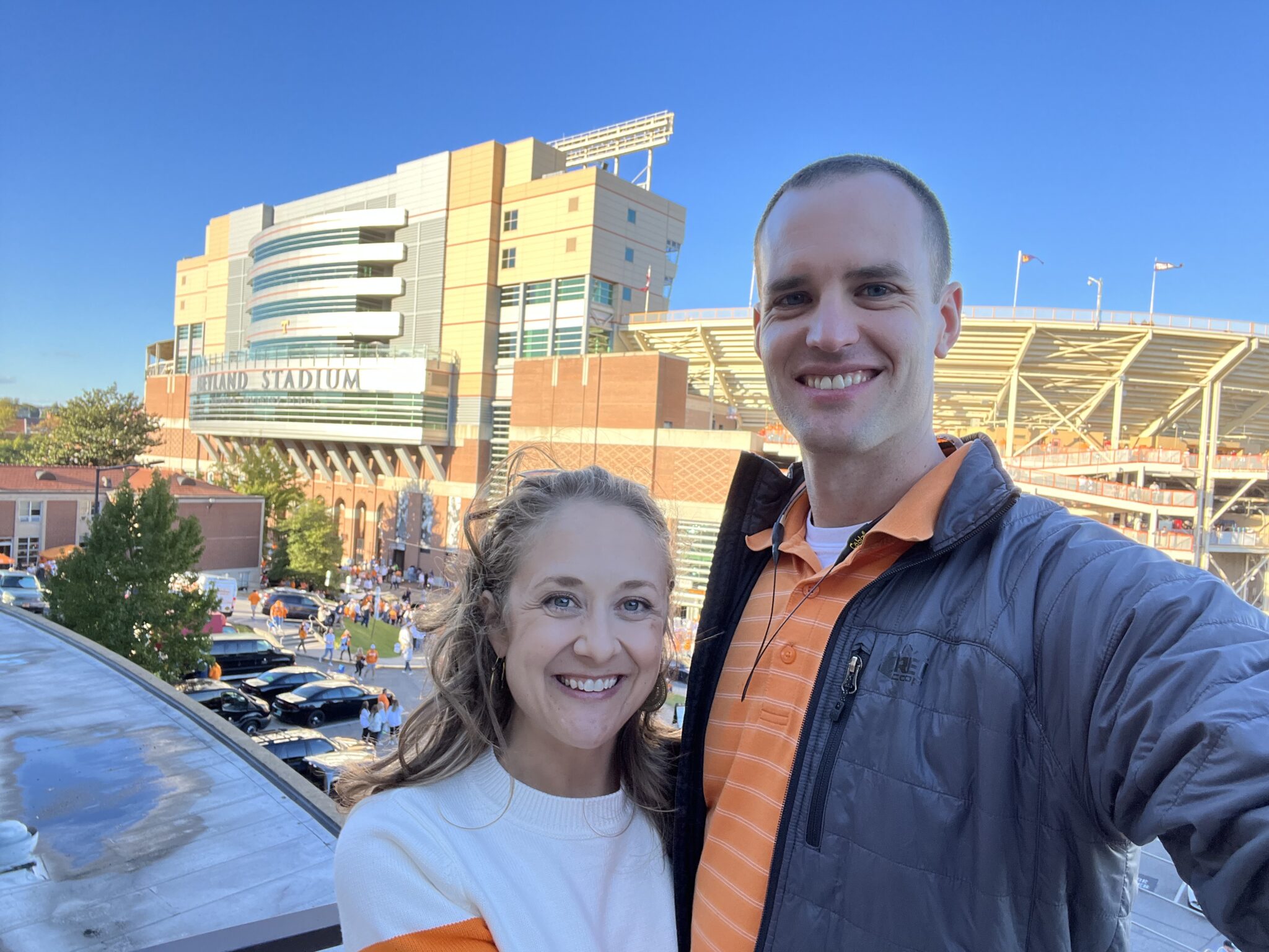 Laura and Elliott Moore pose in front of Neyland Stadium.